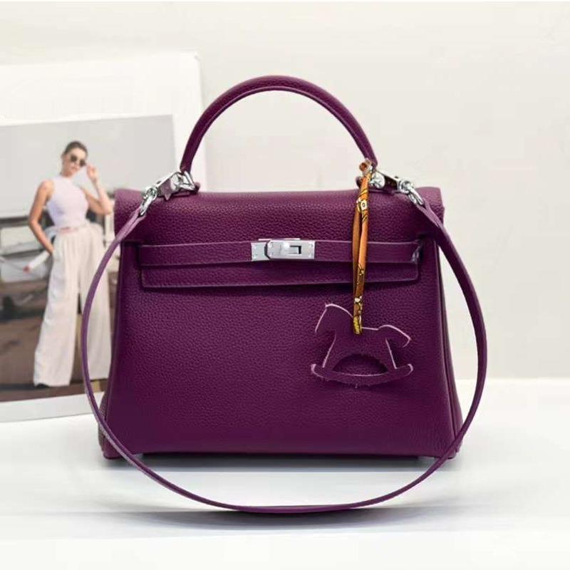 

Сумка с серебряной пряжкой и широкими плечевыми ремнями TOGO Head Layer из натуральной кожи с серебряной пряжкой, сетка, красная, актиния, фиолетовая женская сумка 25x10x20cm+Width Thin Shoulder Strap фиолетовый