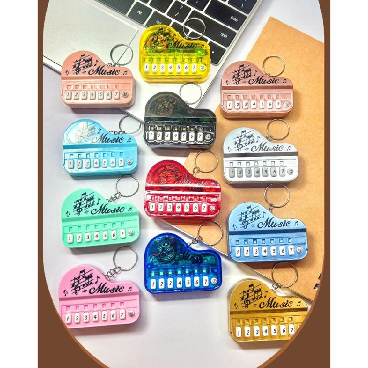 Pocket Sized Electronic Piano Keychain Toy With Multicolor Illuminated Keys Portable Music Learning Device For Children
