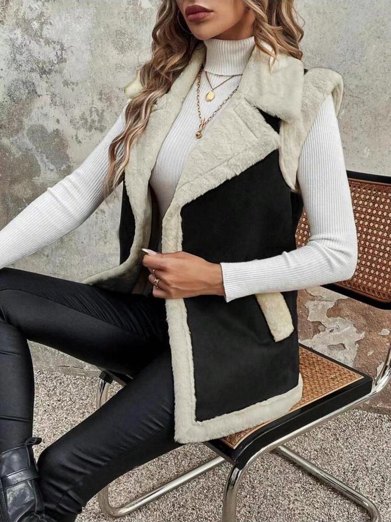 Vestă de damă de lungime medie, din lână de miel îmbinată, la modă