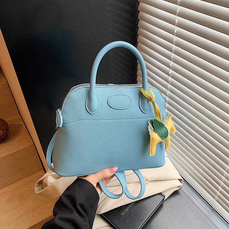 Fashion backpack women's new high-end versatile handbag niche design shell bag