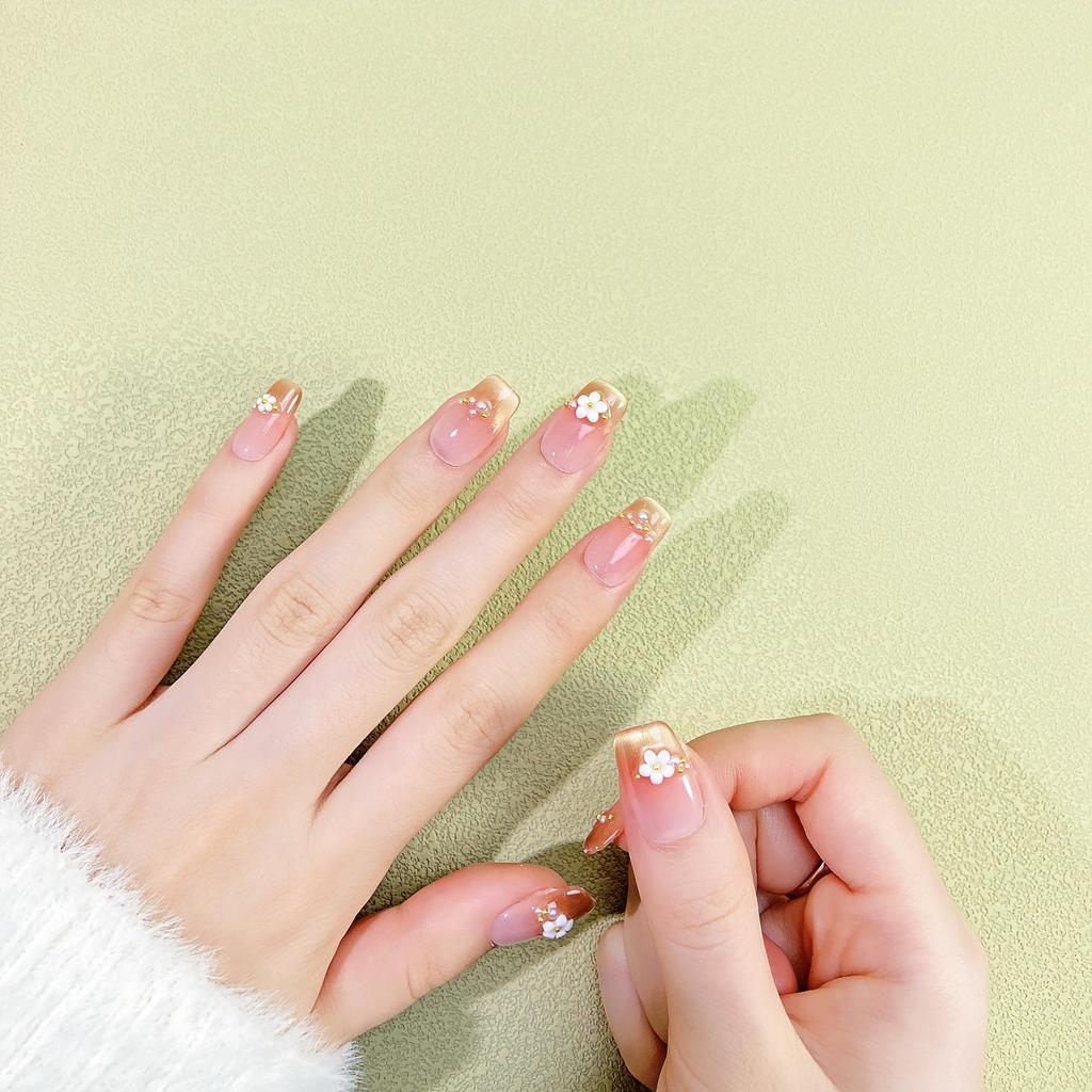 Handmade Nude Pink Cat Eye Manicure with Floral Design - Exquisite Shiny Nail Tips
