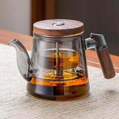 Der Ganzglas-Innentopf der Teekanne ist ein Haushalts-Druckknopf-Tee-Wasser-Trenntasse mit schwebendem Design.