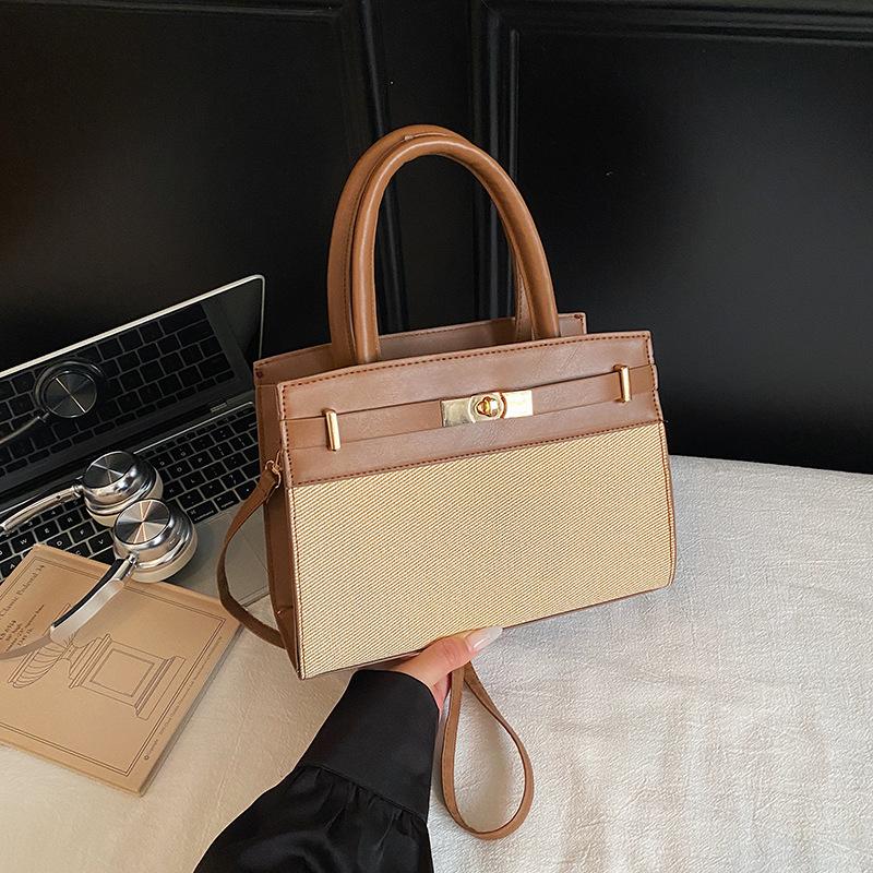 New women's contrasting color handbag bag fashionable high-quality texture shoulder messenger commuter small square bag