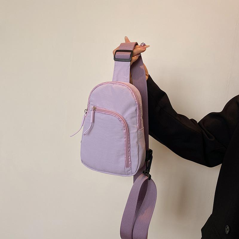 Solid color light and simple going out portable casual mobile phone bag sports shoulder messenger bag breast bag men and women