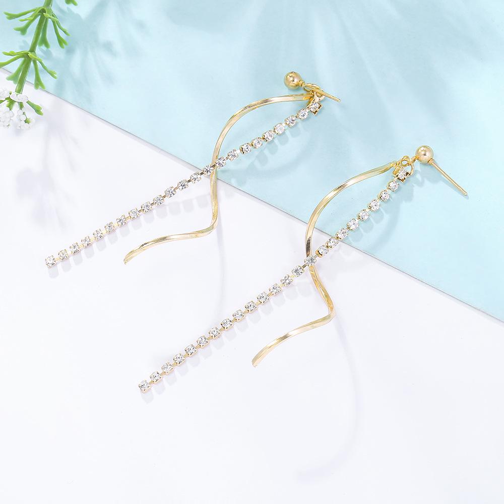 

Серьги-кисточки со стразами в японском и корейском стиле с волнистым дизайном - Стильные и универсальные пусеты и клипсы для ушей