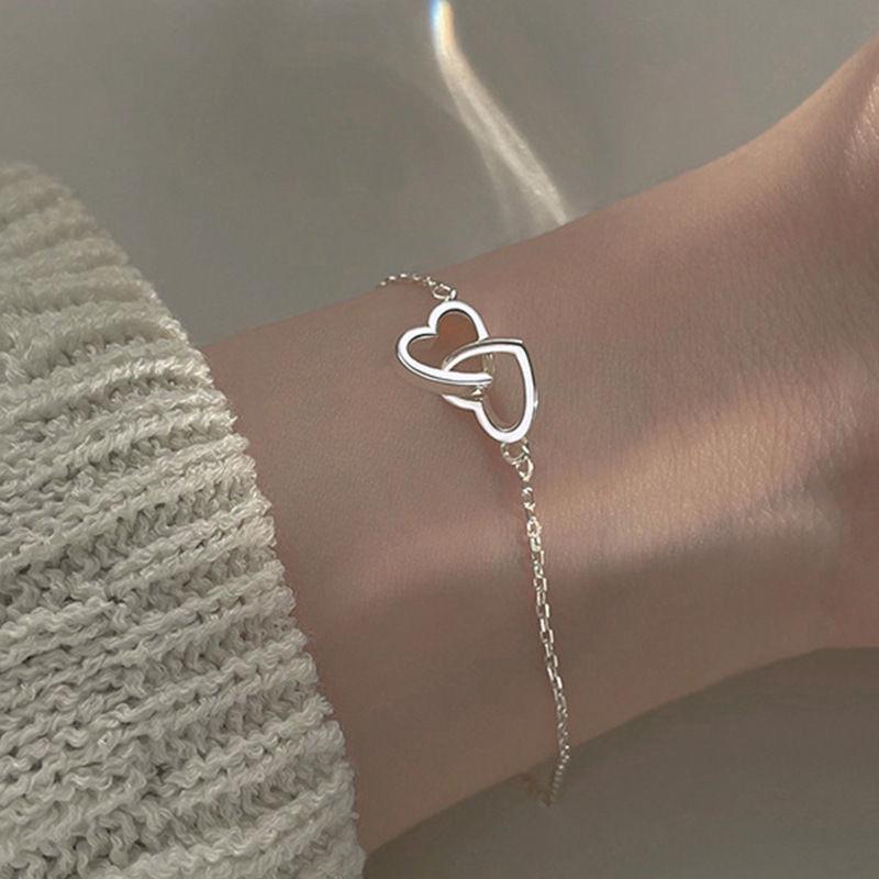

Women s Minimalist Double Heart Bracelet - Korean Style Hollow Design