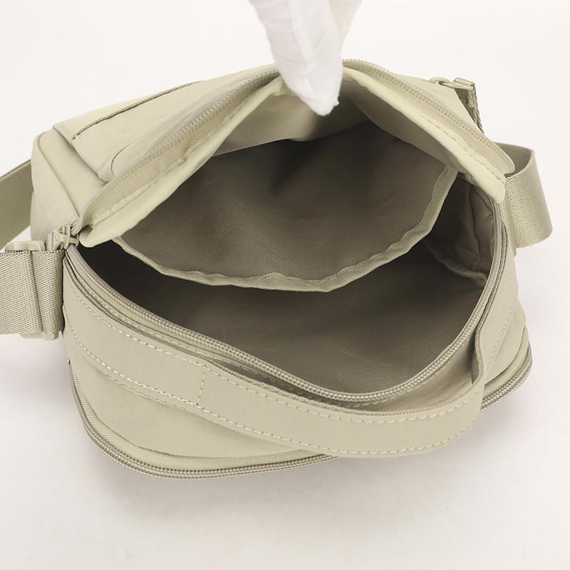 Nylonová crossbody taška s horním uchem a přední kapsou na zip pro muže i ženy pro každodenní použití