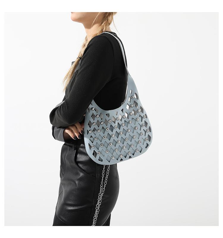 Hollow Underarm Bag for Women with Niche Design 2024 New Hollowed Out Sky Star Commuting Fashionable Rivet Single Shoulder Crossbody Bag
