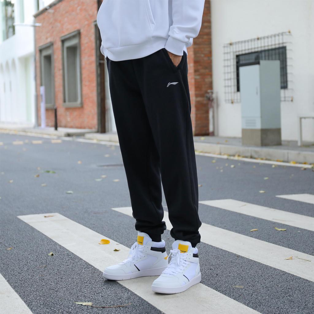 Li-Ning Solid Color Cuffed Pocket Zipper Regular Fit Casual Knit Sports Pants Men pants Black AKLS675-1