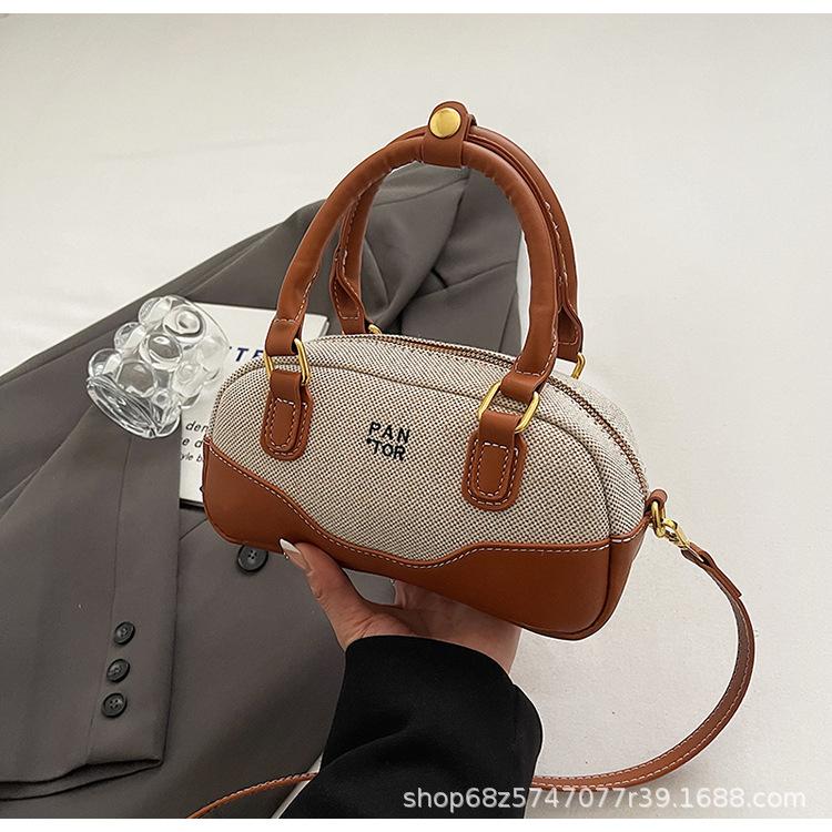 

New products explosive Korean trend casual high-end handheld bowling bag bag commuter foreign niche crossbody bag girl