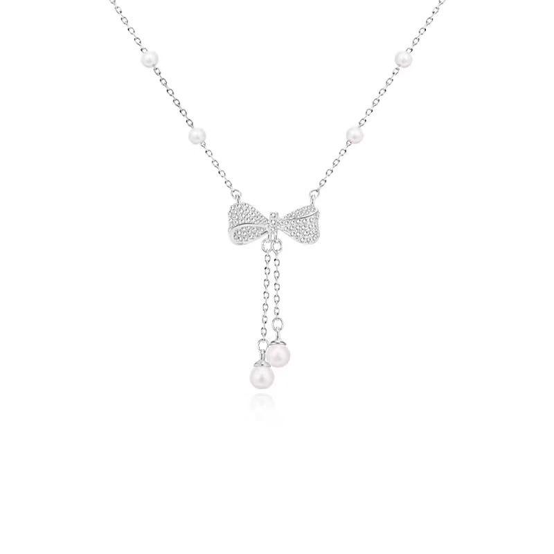 2024 Luxury Pearl Bow Tassel Necklace for Women - Chic Clavicle Chain Accessory