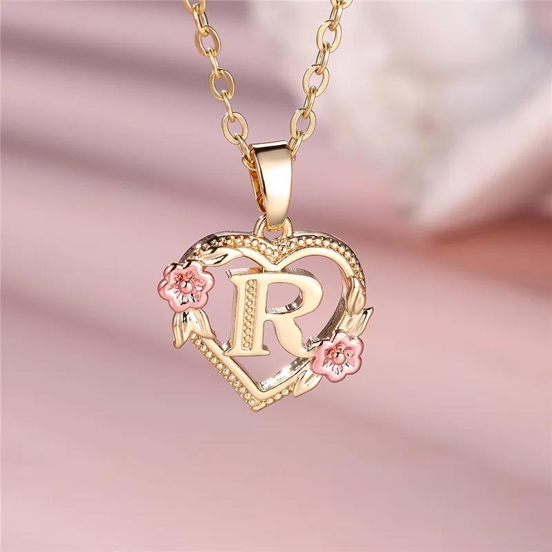 Fashionable and Light Luxury Hollowed-out Heart-shaped Flower Letter Necklace, A Unique and Elegant Collarbone Chain for Women