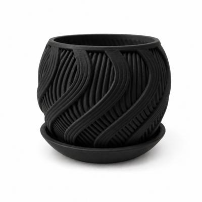 Black Wavy Flowerpot with a Modern Decorative Saucer