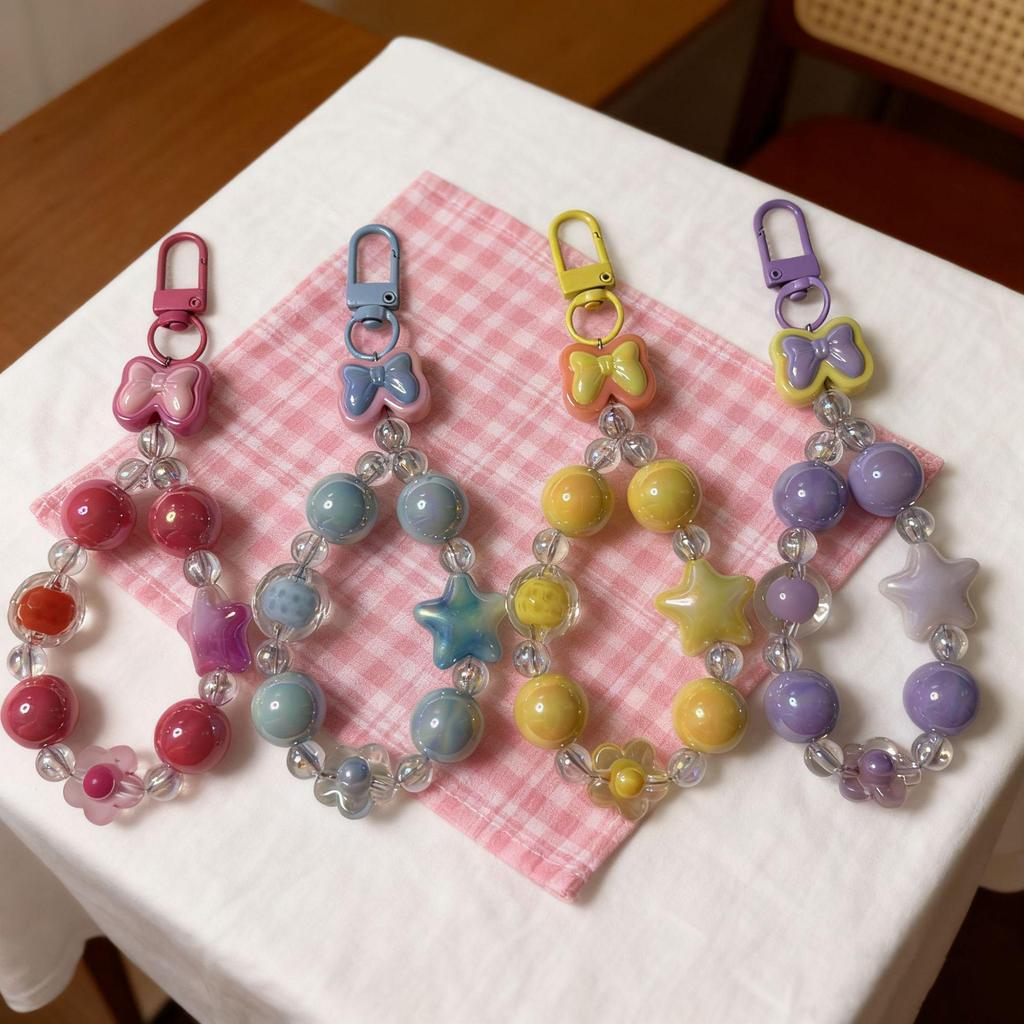 Handmade Beaded Phone Lanyard Keychain with Cute Bow, Lip Gloss Charm, and High-End Bag Pendant