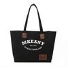 New large-capacity canvas handbag women's 2025 autumn fashion printed letter tote bag casual simple bag