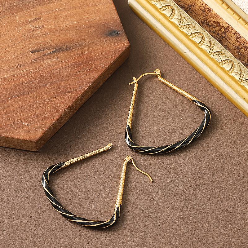 French retro elegant small fragrance dripping oil irregular geometric ring earrings women s atmosphere fashionable high-end earrings