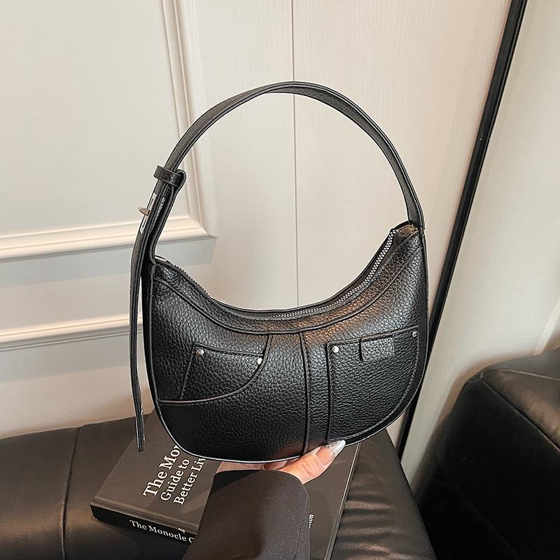 

Высококлассная нишевая сумка женская 2025 новая летняя универсальная плечевая сумка-подмышка модная портативная сумка-пельмень чёрный