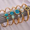 Creative Blue Eye Pattern Gold-Plated Stainless Steel Bracelet