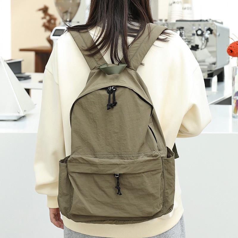 IELGY Japanese casual literary canvas schoolbag, simple washing water and old backpack, khaki fashion nylon backpack.