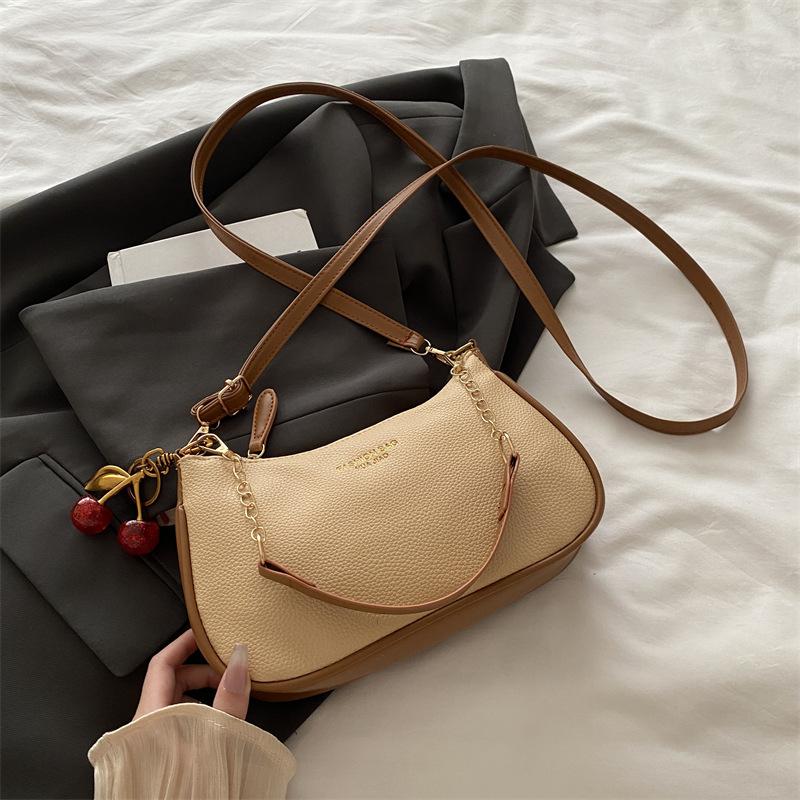 Fashion trend solid color underarm bag women's 2026 new shoulder handbag texture shoulder messenger bag handbag