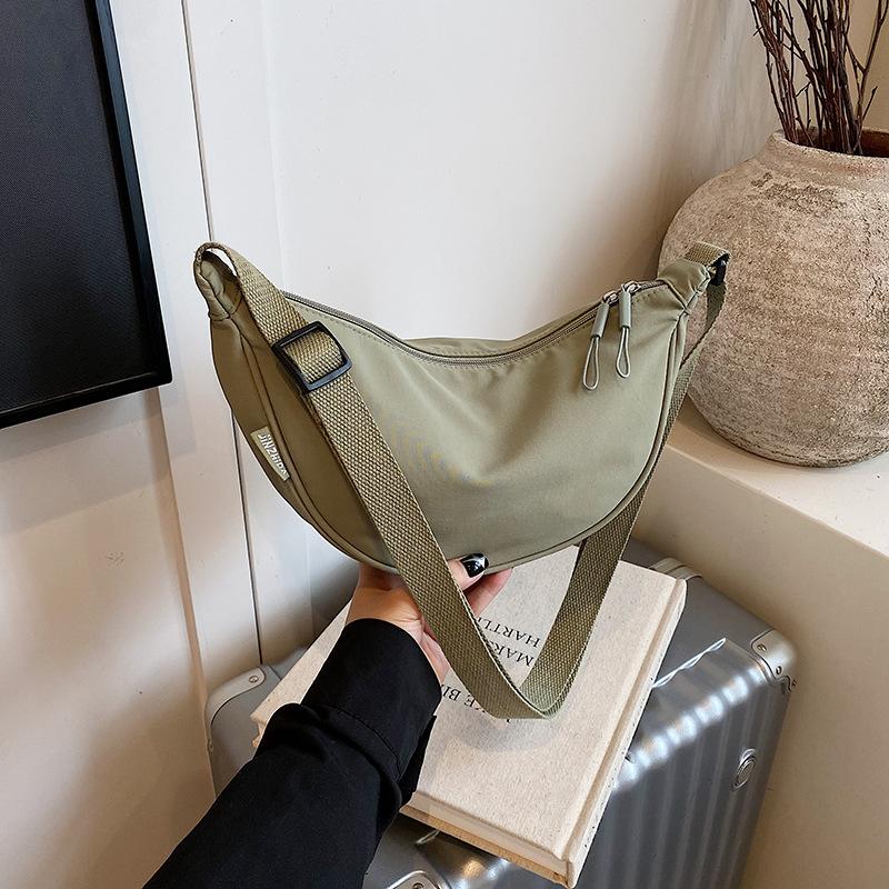Casual simple dumpling bag nylon canvas bag female messenger bag versatile breast bag lightweight underarm bag