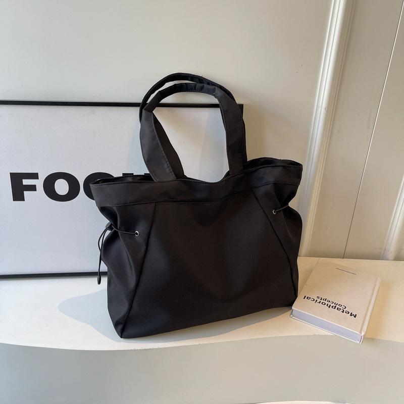 Large-capacity tote canvas bag, high-value commuting to work and going out, literary and artistic student clothing book, shoulder cloth bag bag.