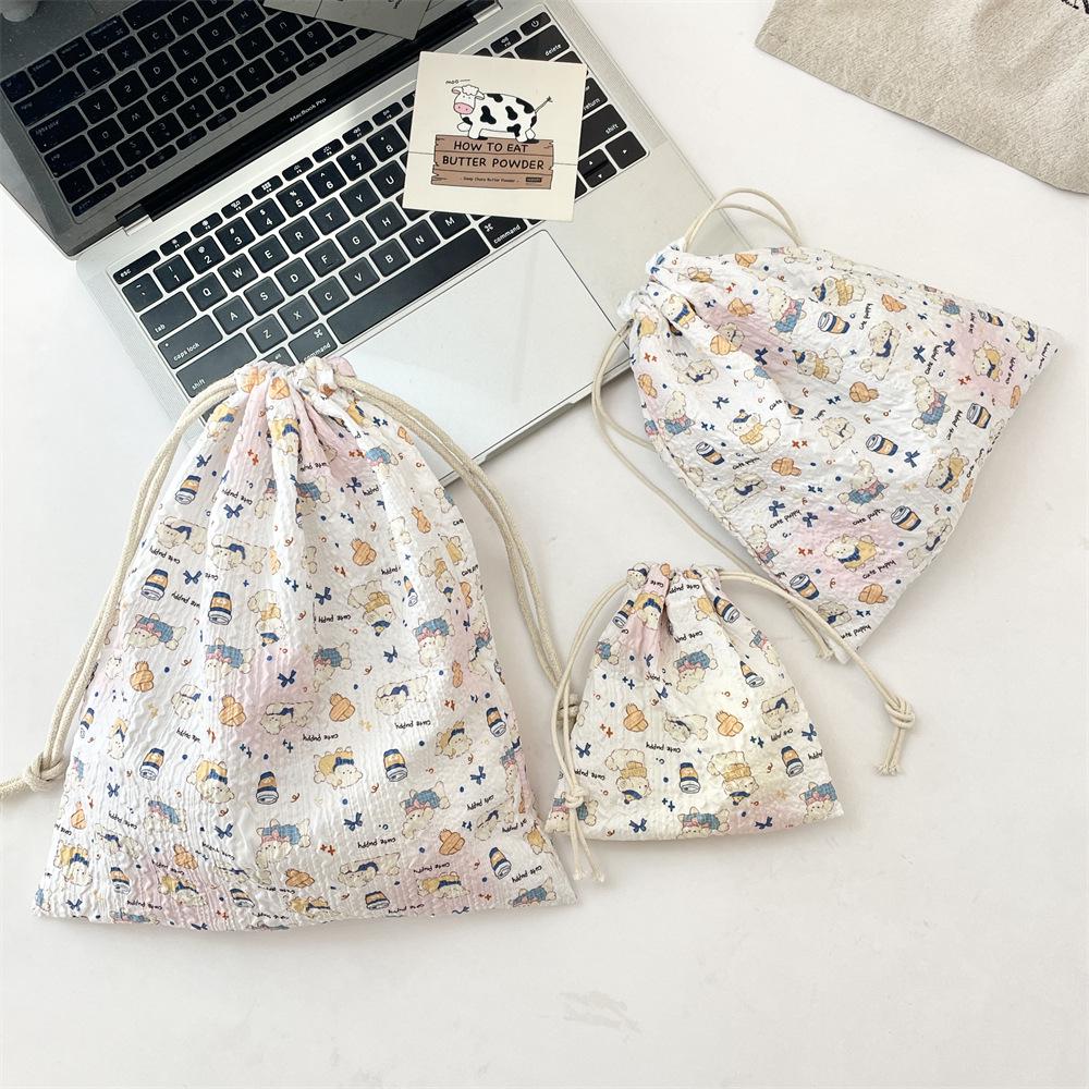 Embossed Cartoon Drawstring Bag - Dustproof Portable Cloth Organizer for Cosmetics
