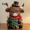 Cute Cattle Desk Ornaments Christmas Highland Cow Figurine, Resin Holiday Statue with Santa Hat & Holly Theme Decor Gift Box, Sitting Calf Desktop