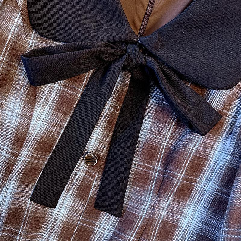 Ein neues Damen-Herbst- und Winterkleid in Übergröße mit Puppenkragen und modischem Karomuster-Design