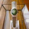 [USED] Seiko antique hand-wound wristwatch in excellent working condition, gold-plated, green, and silver.