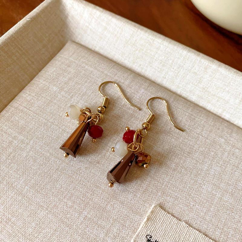 Ethnic style round water drop hollow ear hook retro high-end fringed earrings fashion light luxury trend earrings