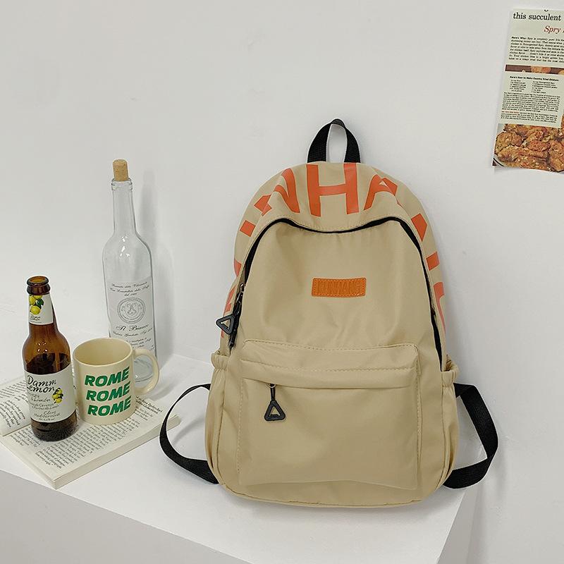 High value letter printing, junior high school students, primary school students, simple and versatile, ultra-light college style backpack