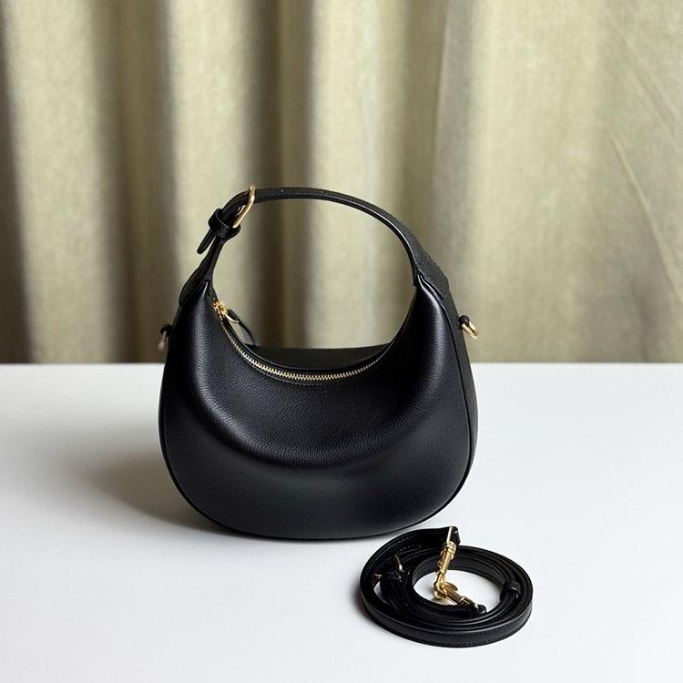 The new crescent-shaped bag, hand-held top layer cowhide women's bag, single-shoulder crossbody genuine leather underarm bag, exudes a sense of luxury