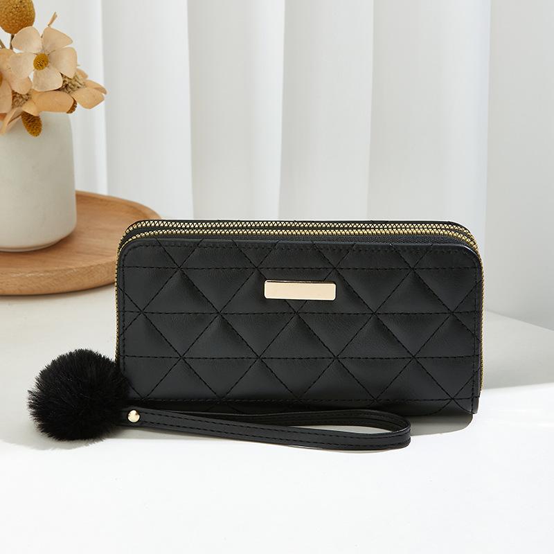 New double-layer clutch wallet, rhombus hairball decoration, long change bag, women s leisure bag.