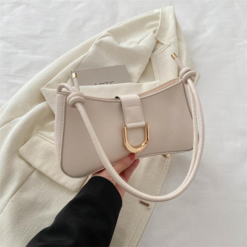 

Модная женская сумка с текстурой тренда 2024 года, новая персонализированная мода, простая однотонная сумка через плечо подмышкой белый