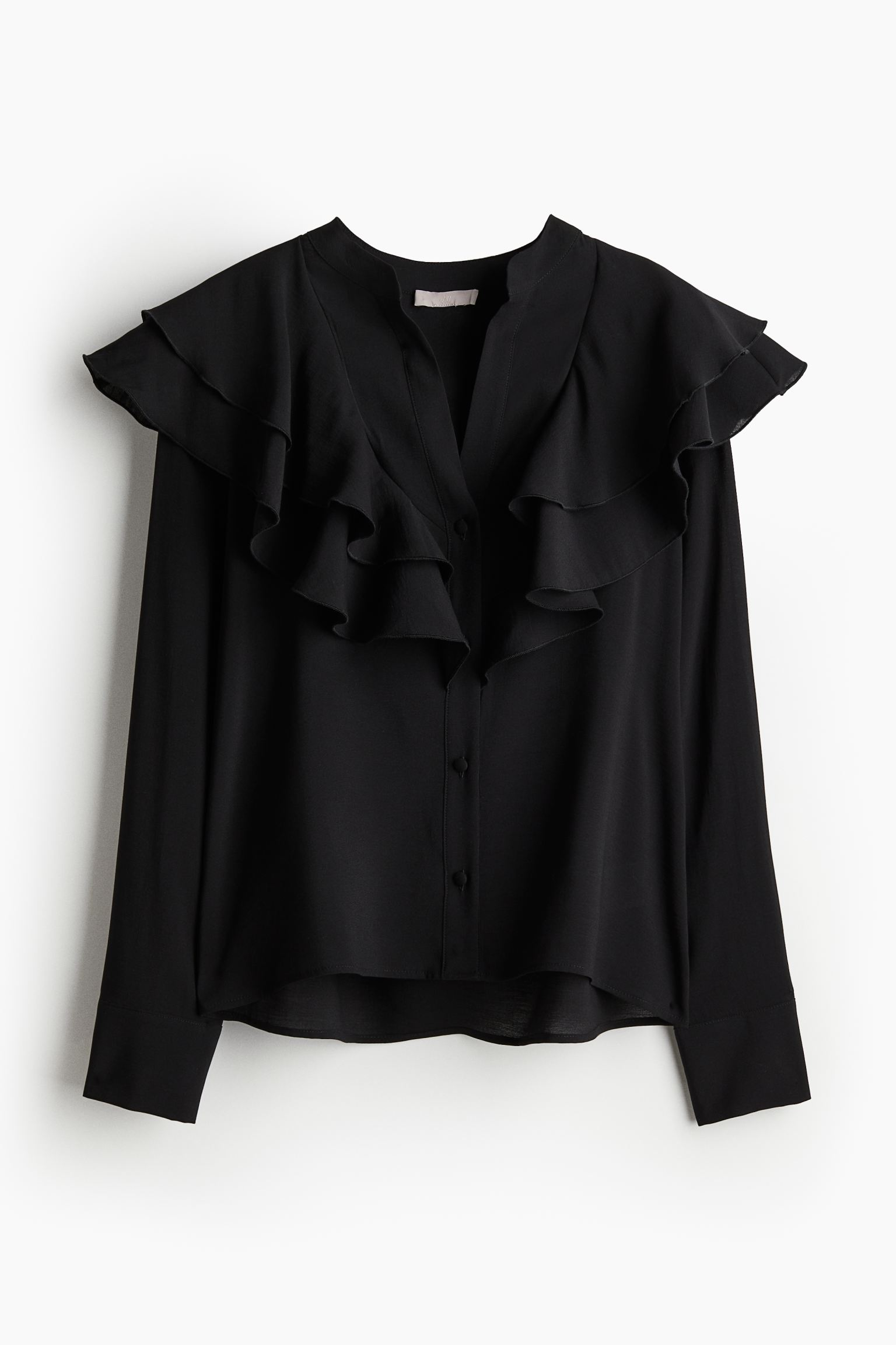 

Блузка с воланами