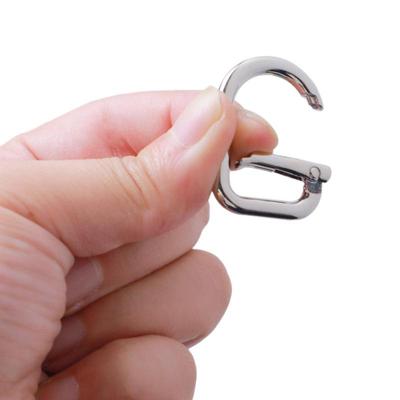 Horseshoe Bag Charm with Multi-Color Zinc Alloy Quick Release Buckle and Oval Door-Shaped Clip.