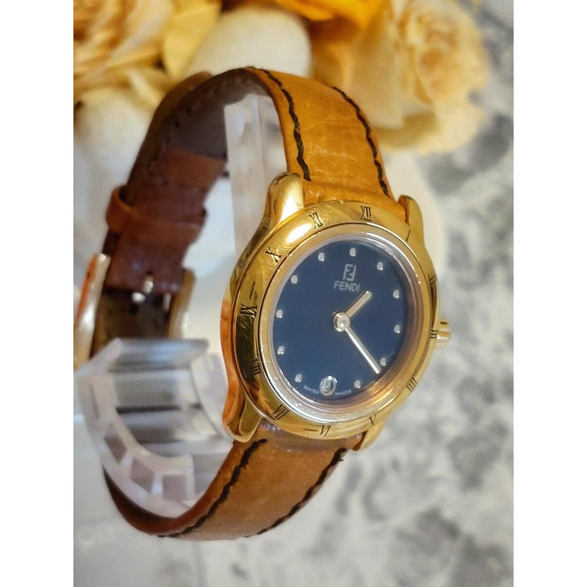 Used Working item, new battery replaced, FENDI women s watch, gold date, black dial, genuine belt, vintage