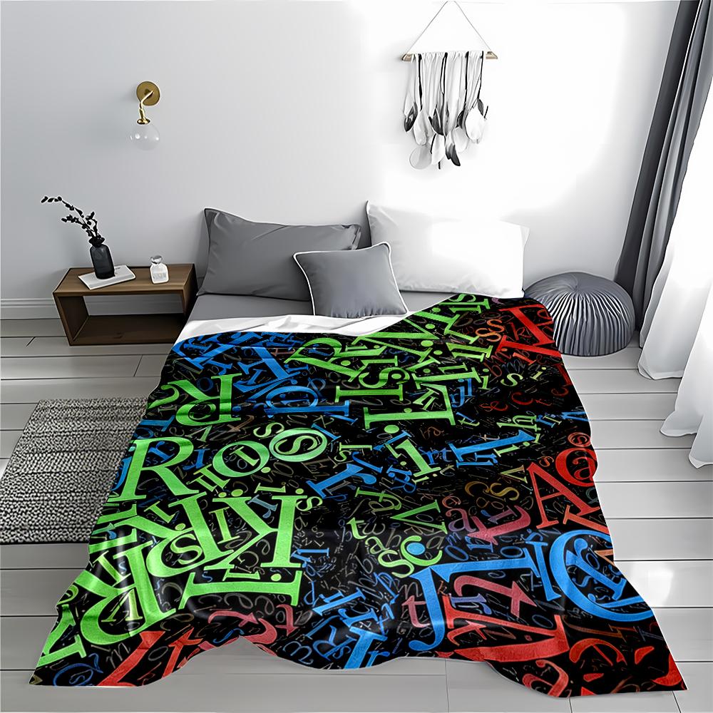 Colorful Alphabet Pattern blanket with Vibrant Letters on Black Background blanket, suitable for use in the bedroom, living room, on the sofa
