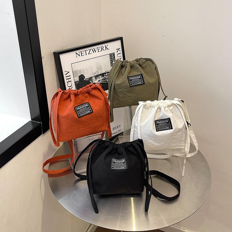 New popular bag shoulder crossbody nylon bag contrasting color small bag drawstring bucket women's bag