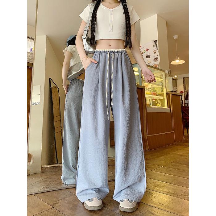 

Women s Summer Ice Silk Wide-Leg Pants with Color-Blocking, Drawstring, and Pockets - Thin, Textured, Draped, Floor-Length Casual Style. 3XL синий