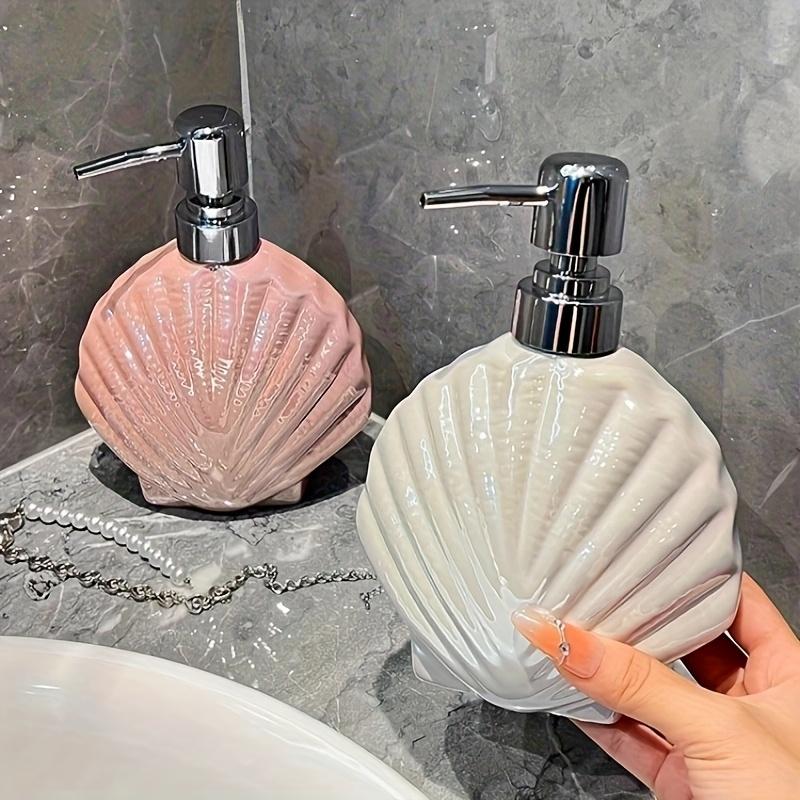 Die ins kreative schillernde glänzende Schale Keramik-Lotionsflasche vereint Praktikabilität und ästhetischen Reiz.. Es ist sowohl für die Küche geeignet