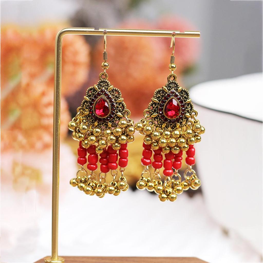 Boucles d'oreilles ethniques européennes-américaines bohèmes à strass et clochettes perlées - Style rétro audacieux