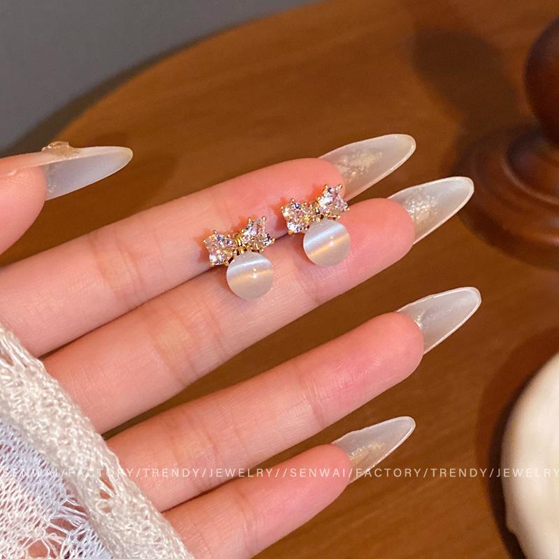 Sparkling zirconium bow opal earrings women s niche unique earrings Korean Internet celebrity earrings