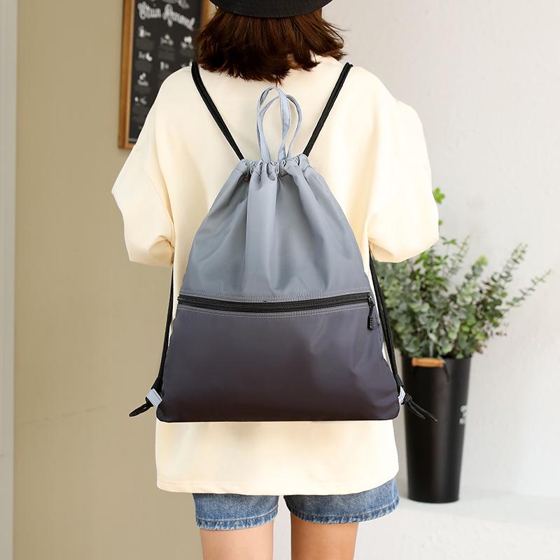 

Gradient Color Large Capacity Drawstring Backpack with Zippered Outer Pocket Is Suitable for Sports, Travel and Outdoor Activities. S серый