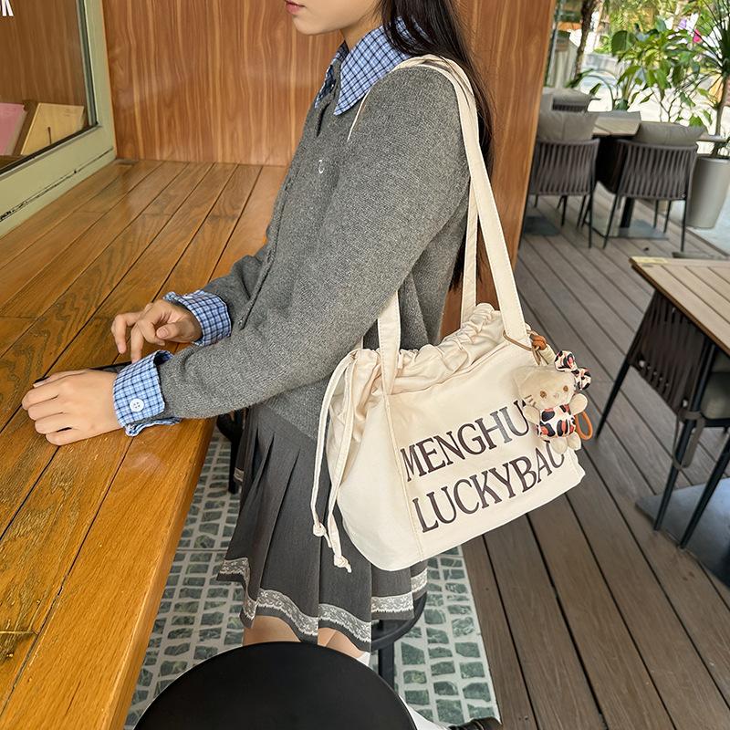 Джинсовая сумка женская сумка через плечо с завязками большая вместительная сумка-тоут — фото 3