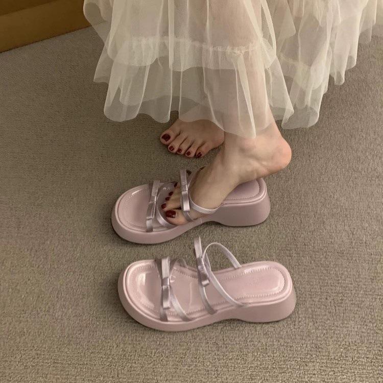 

Gentle thick-soled slope heel cool slippers female new fairy bow one-word drag sweet and elegant sandals 35