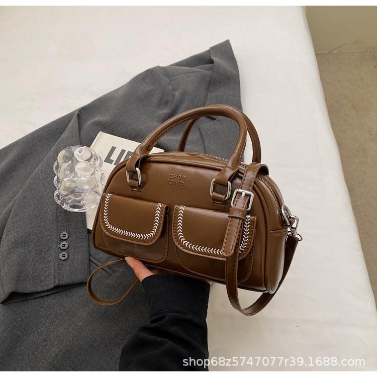 

This year s popular red bowling bag, retro premium textured bag, spring 2025 new commuter shoulder bag