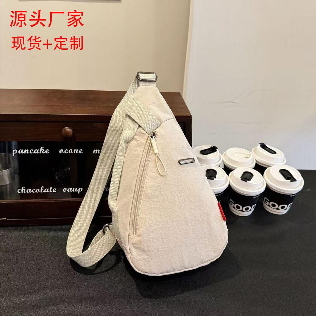 New Japanese simple breast bag couple shoulder messenger bag men's bag large capacity storage bag women