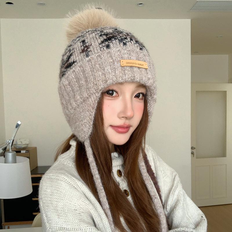 Winter hat women's snowflake jacquard warm knitted hat windproof and cold protection ear protection headgear versatile casual wool hat
